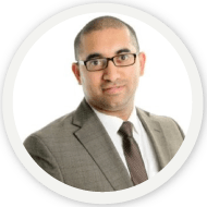Professional man in brown suit symbolizes SysAid's ITSM efficiency and seamless Help Desk solutions. - SysAid
