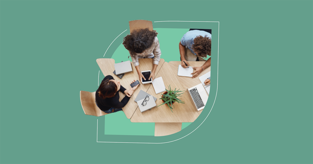 Three people collaborate over laptops and tablets, embodying SysAid's ITSM solutions for efficient Service Desk management. - SysAid