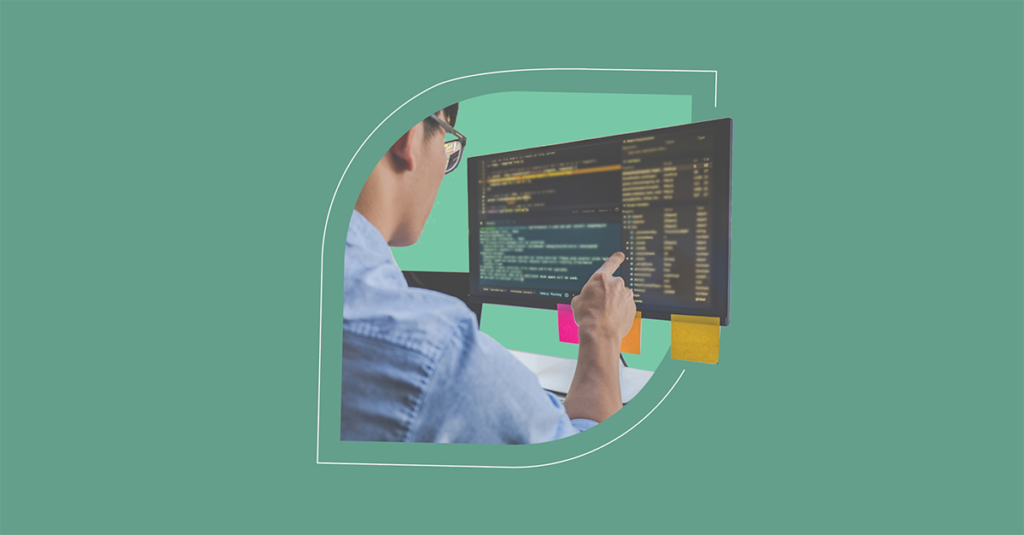 A focused individual coding on a computer, illustrating the Service Desk's role in streamlining ITSM with modern efficiency. - SysAid