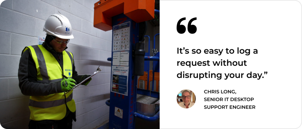 A worker uses a tablet near industrial equipment, illustrating how SysAid ITSM streamlines IT request logging on-site. - SysAid