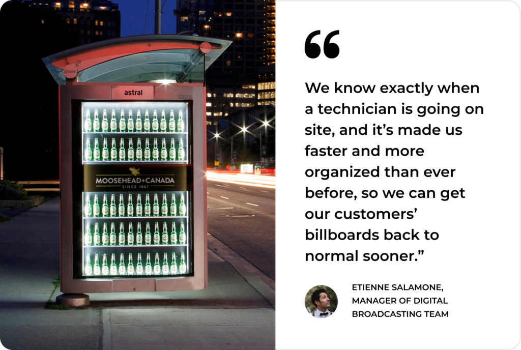 A bus stop ad at night highlights improved technician efficiency using SysAid ITSM, per a broadcasting manager’s testimonial. - SysAid
