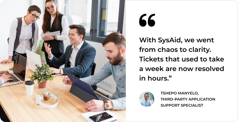 A team in a meeting room discussing ITSM strategies, enhancing ticket resolution with SysAid's Service Desk solutions. - SysAid